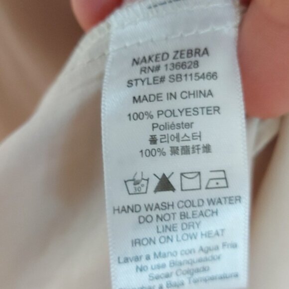 Naked Zebra blouse with tie front closure ruffle detail on the sleeve and collar - Picture 6 of 7